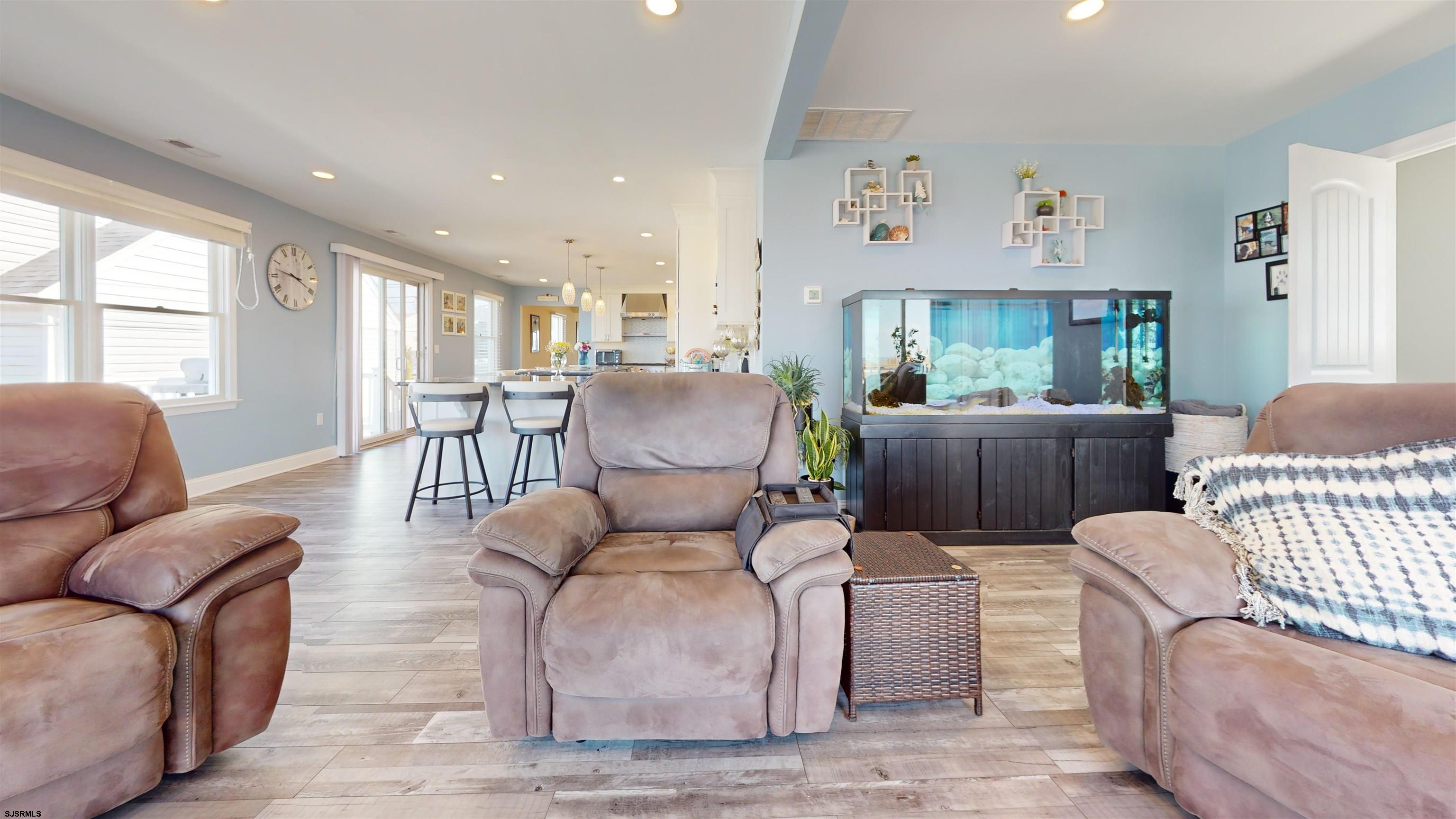 4205 Atlantic Brigantine Boulevard Brigantine, NJ 08203 - Photo 54 of 58 a living room with furniture and a large window