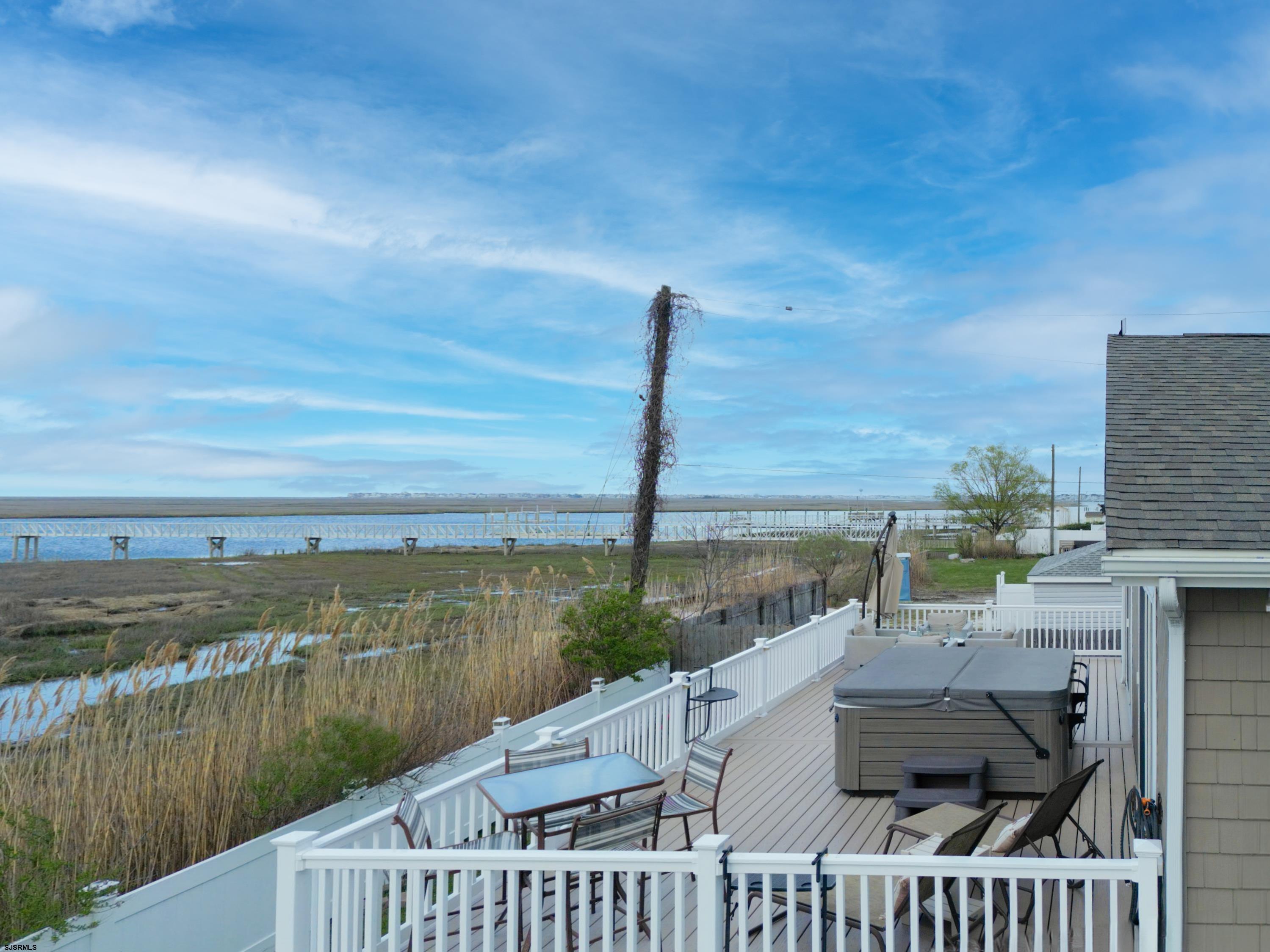 4205 Atlantic Brigantine Boulevard Brigantine, NJ 08203 - Photo 55 of 58 a view of a lake with a terrace
