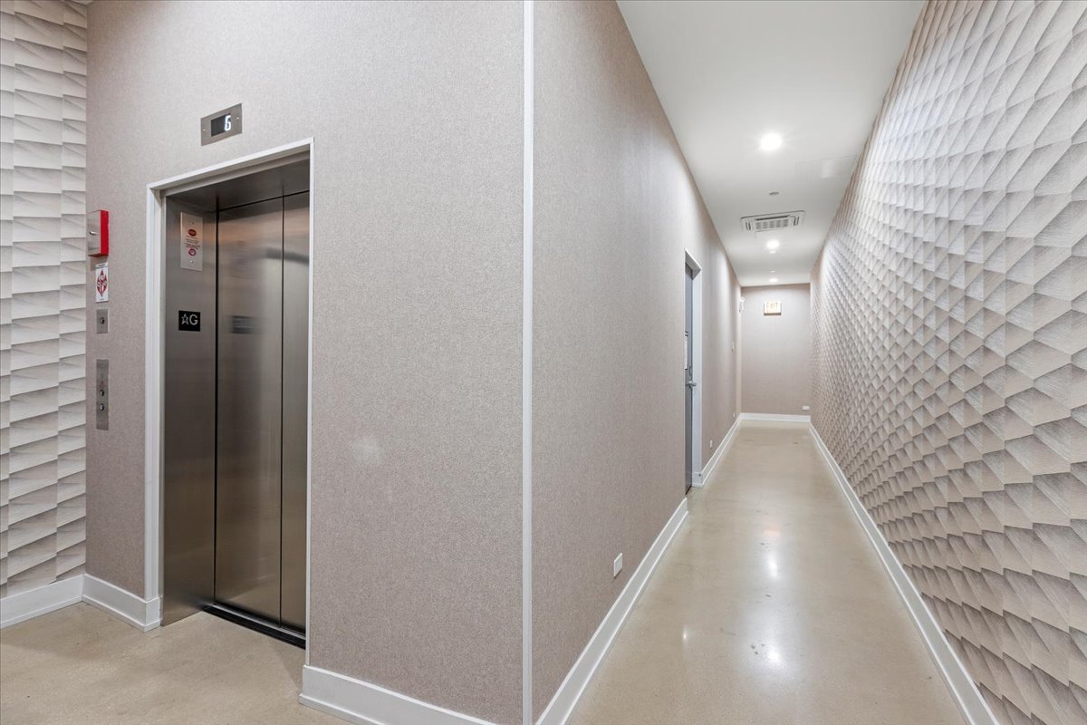 2317 North Clark Street, Unit 410 Chicago, IL 60614 - Photo 14 of 16 a view of hallway with stairs