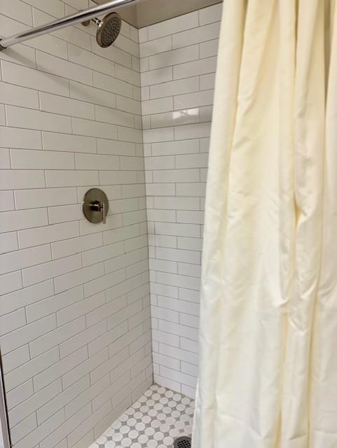 26 Skyland Drive West Locust Grove, GA 30248 - Photo 18 of 29 a bathroom with a shower