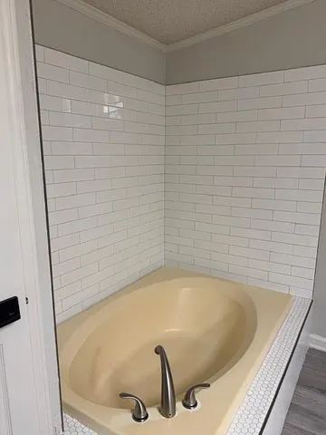 a bathroom with a tub