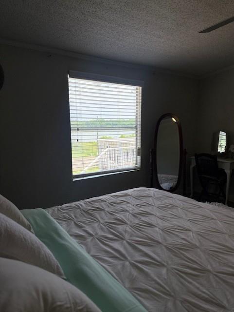 26 Skyland Drive West Locust Grove, GA 30248 - Photo 28 of 29 a bedroom with a bed cabinets and a window