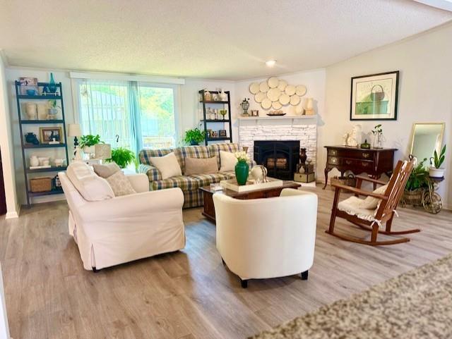 26 Skyland Drive West Locust Grove, GA 30248 - Photo 10 of 29 a living room with furniture and a fireplace
