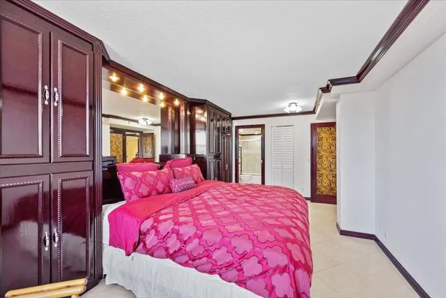 a bed room with a bed and a window