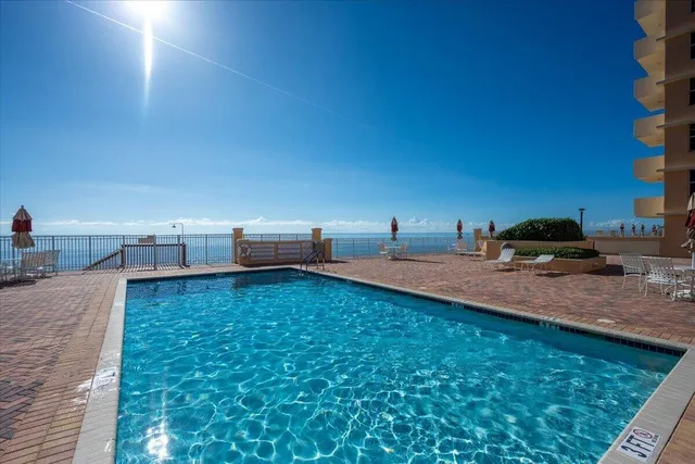 a view of a terrace with chairs