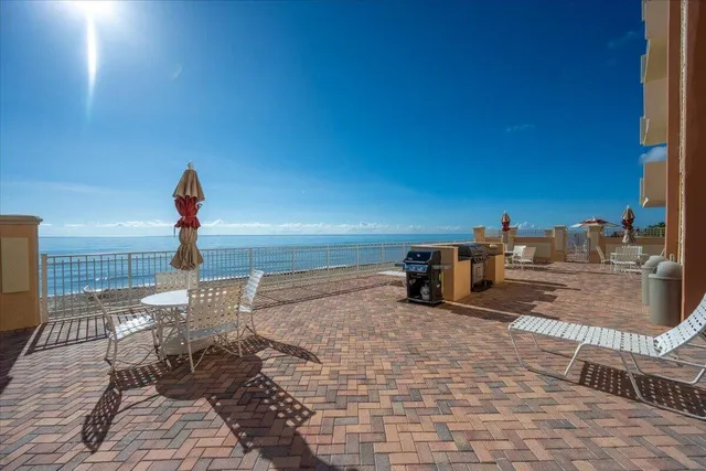 a view of a terrace with chairs