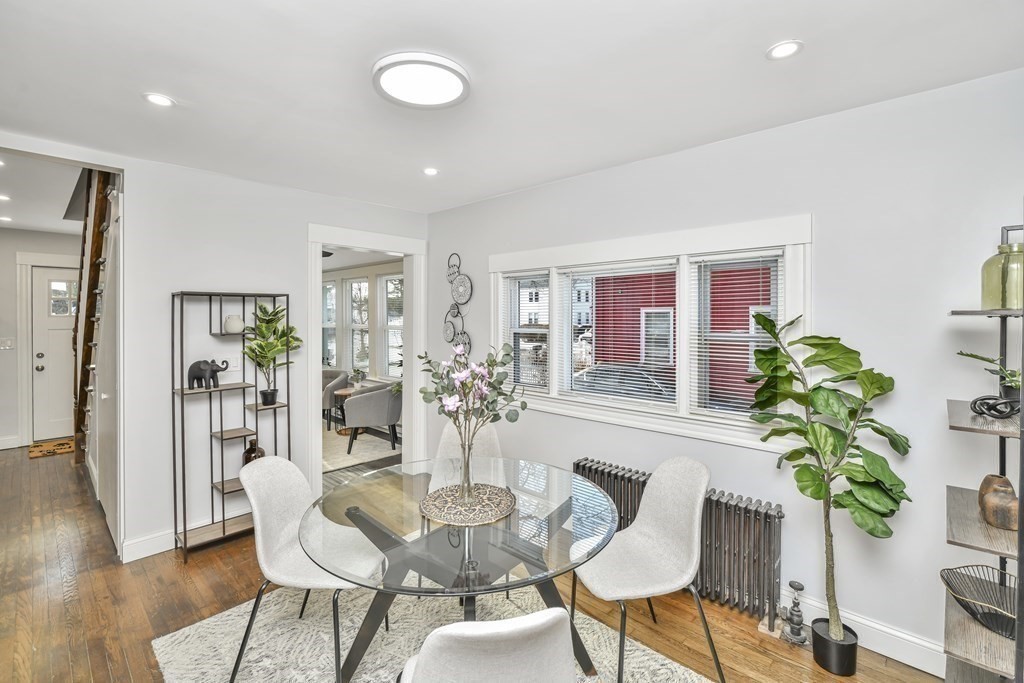 234 Rockland Street Canton, MA 02021 - Photo 34 of 38 a view of a dining room with furniture window and wooden floor