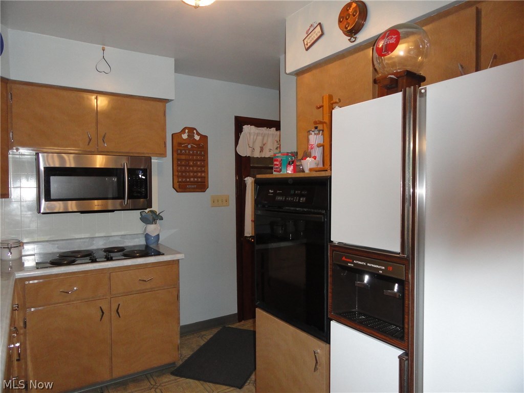 141 Arner Road Chester, WV 26034 - Photo 6 of 26 Kitchen opens to garage for easy access