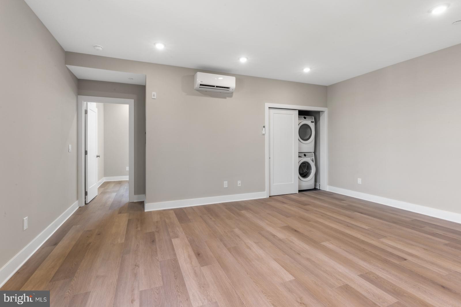 6712 Ridge Avenue, Unit 204 Philadelphia, PA 19128 - Photo 5 of 18 a view of an empty room with wooden floor