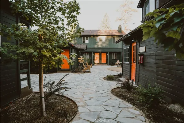 a view of a chairs and tables in the patio