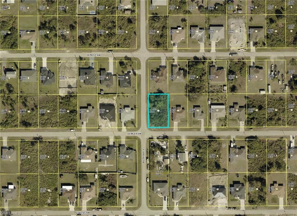 3218 11th Street Southwest Lehigh Acres, FL 33976 - Photo 2 of 2 Aerial map of property and surrounding area featuring property parcel outlined