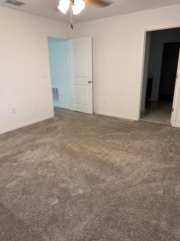 693 Reggie Road Winter Haven, FL 33859 - Photo 2 of 17 a view of an empty room