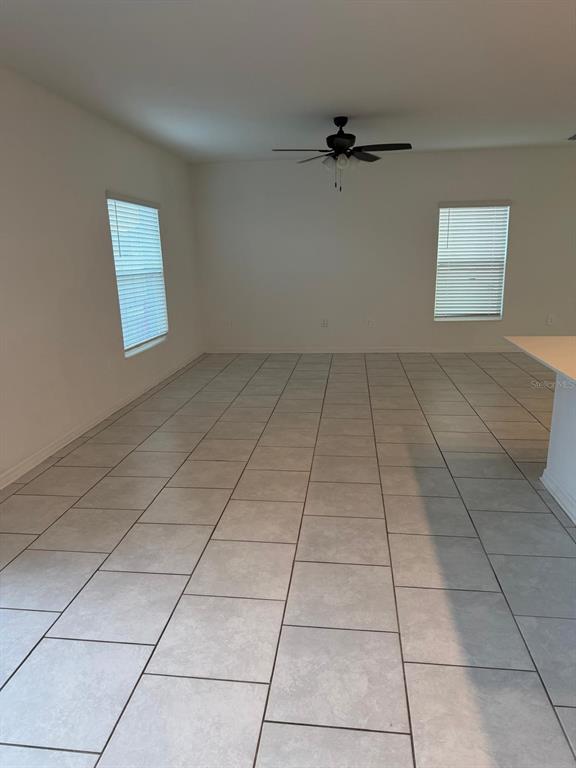 693 Reggie Road Winter Haven, FL 33859 - Photo 4 of 17 a view of a livingroom with white furniture