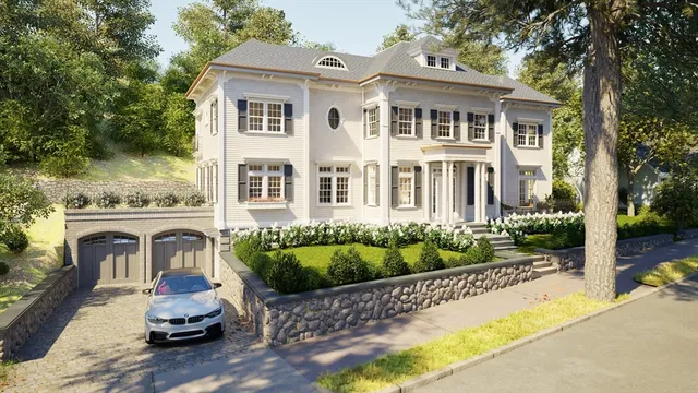 a front view of a house with a garden