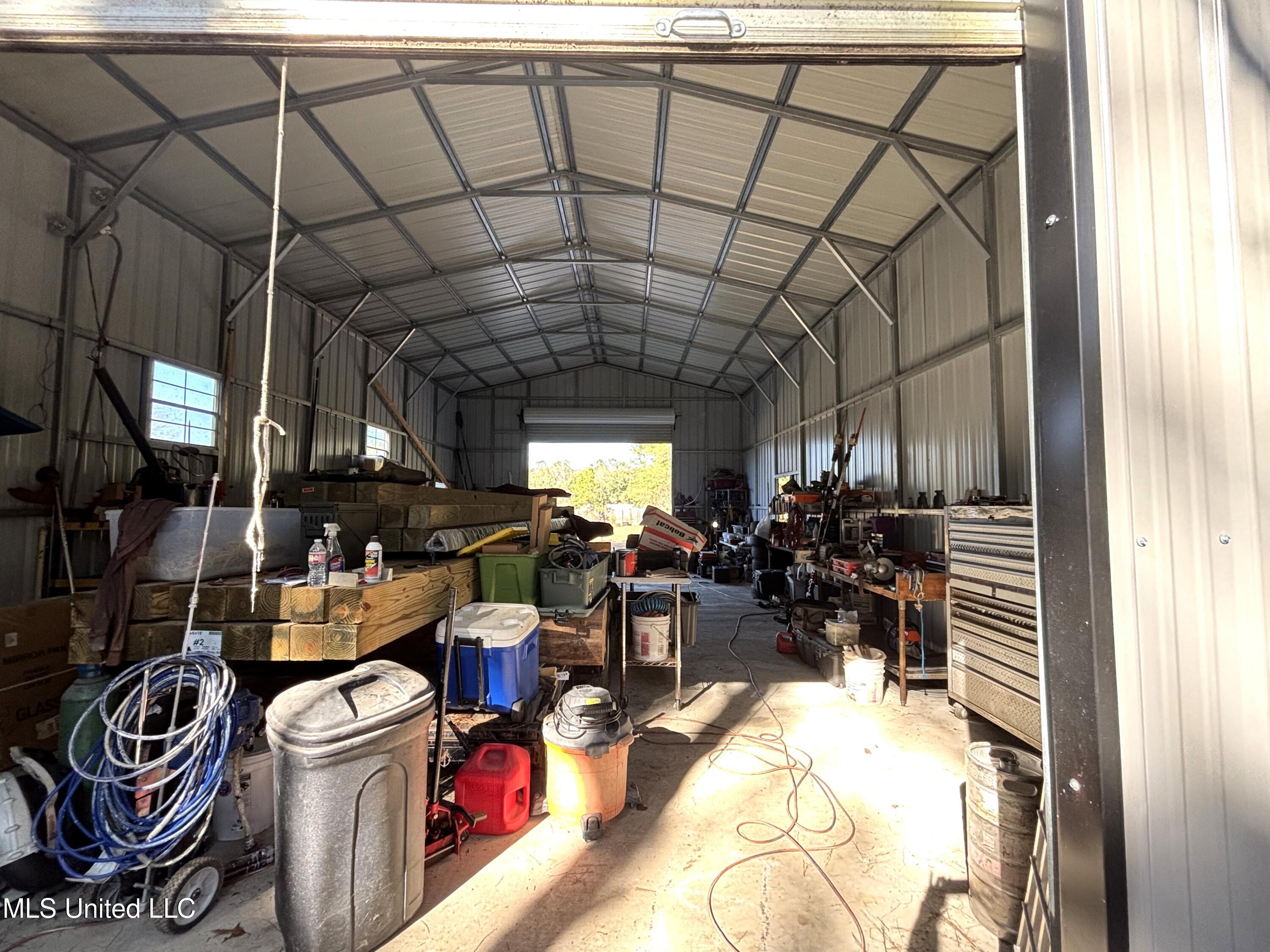 24160 Oak Ridge Drive Pass Christian, MS 39571 - Photo 8 of 23 back bay door