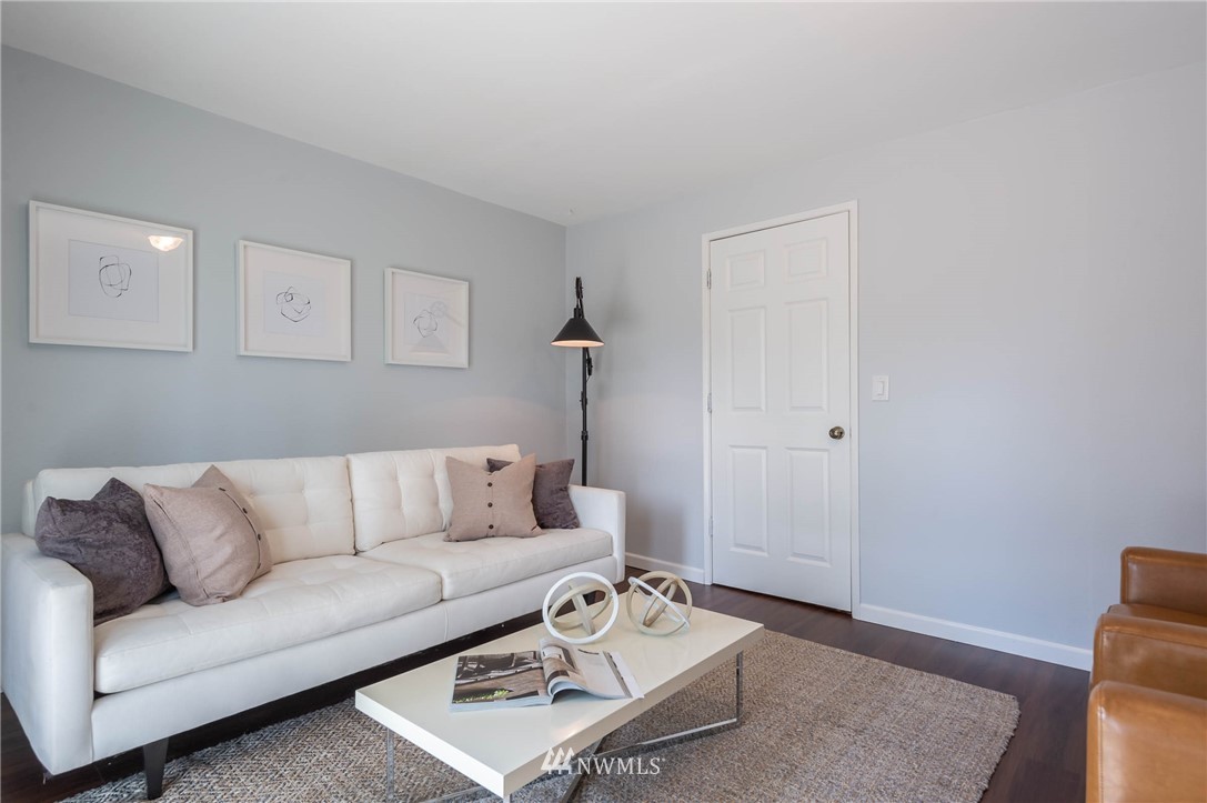 4131 Northeast 19th Street Renton, WA 98059 - Photo 13 of 40 a living room with furniture and a rug