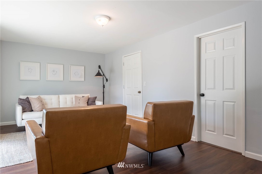 4131 Northeast 19th Street Renton, WA 98059 - Photo 17 of 40 a living room with furniture and a window