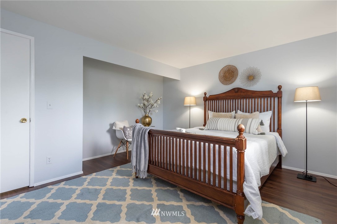4131 Northeast 19th Street Renton, WA 98059 - Photo 21 of 40 a bedroom with bed and a window