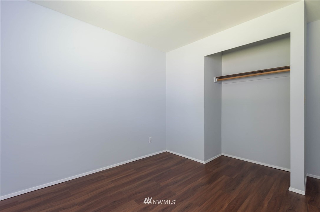 4131 Northeast 19th Street Renton, WA 98059 - Photo 28 of 40 a view of an empty room with wooden floor