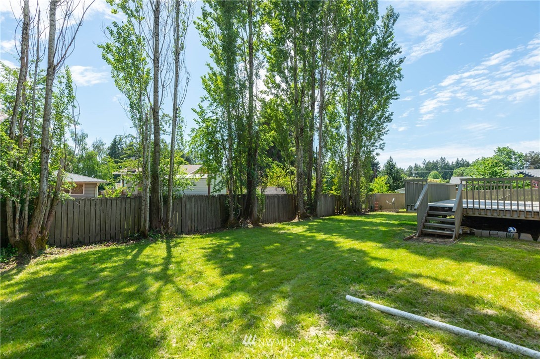 4131 Northeast 19th Street Renton, WA 98059 - Photo 32 of 40 a view of a backyard with a slide