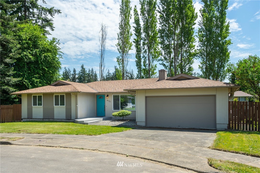 4131 Northeast 19th Street Renton, WA 98059 - Photo 38 of 40 a house view with a garden space