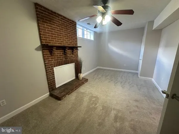 en empty room with windows