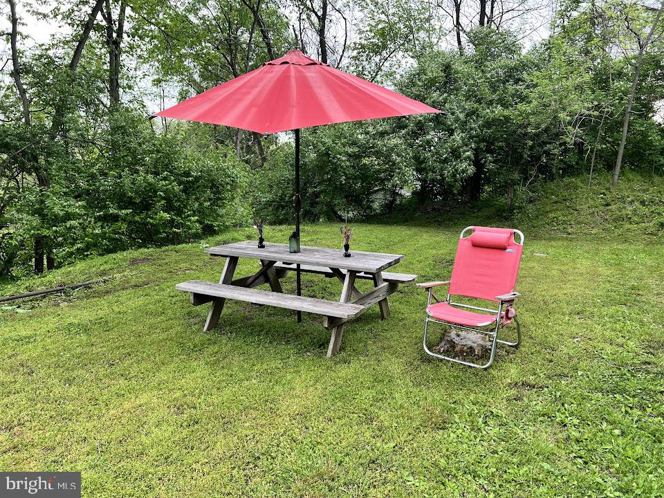 3059 Back Run Road Manheim, PA 17545 - Photo 11 of 19 a table and chairs in the garden