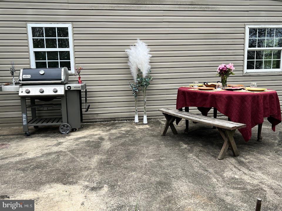 3059 Back Run Road Manheim, PA 17545 - Photo 14 of 19 a view of a chairs and table in the back yard of the house