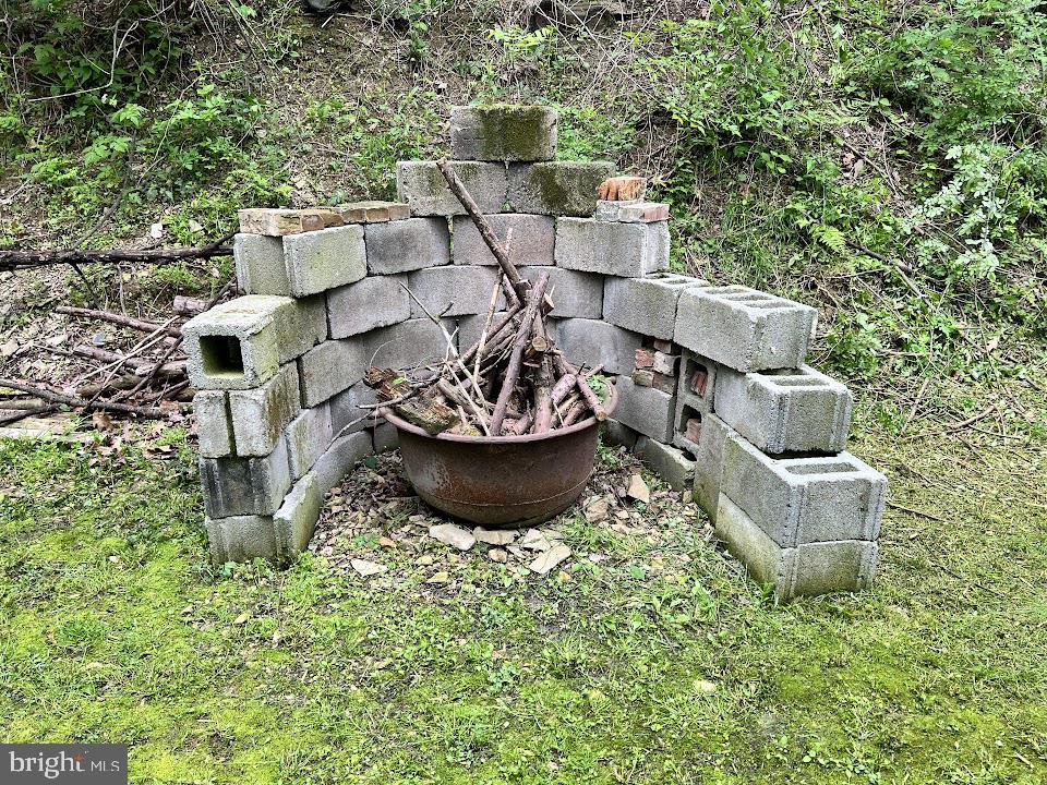3059 Back Run Road Manheim, PA 17545 - Photo 17 of 19 a view of a terrace with chairs and a fire pit