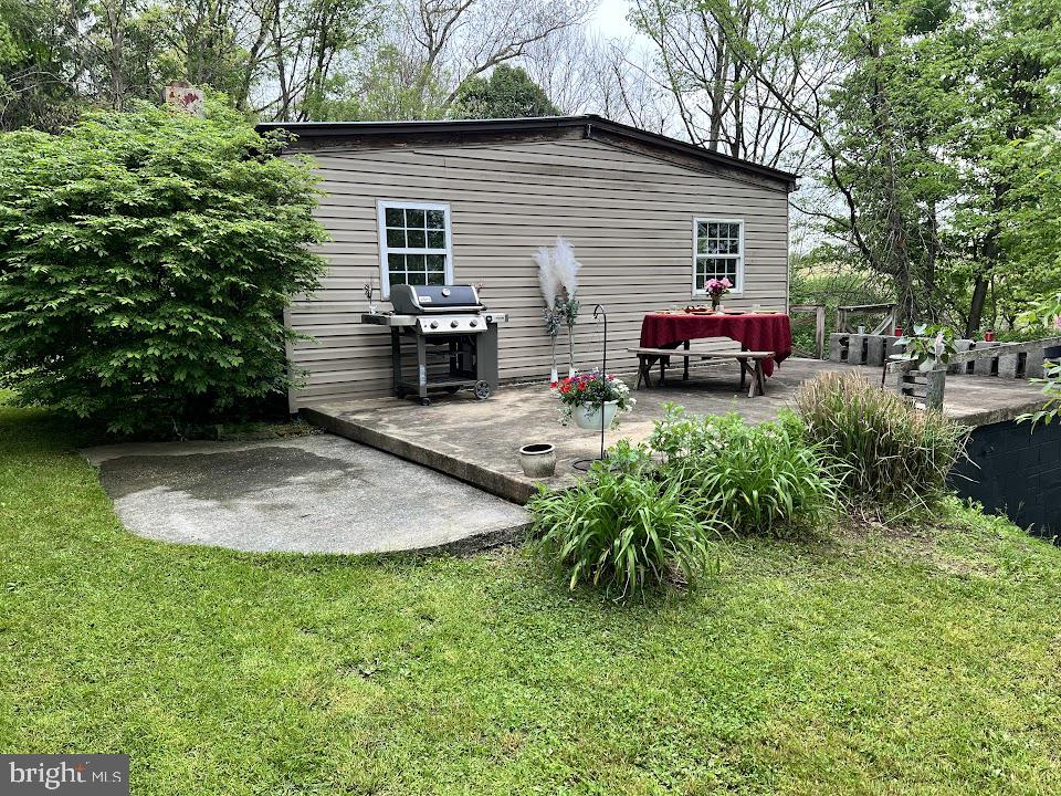 3059 Back Run Road Manheim, PA 17545 - Photo 3 of 19 a view of backyard with barbeque grill and outdoor seating