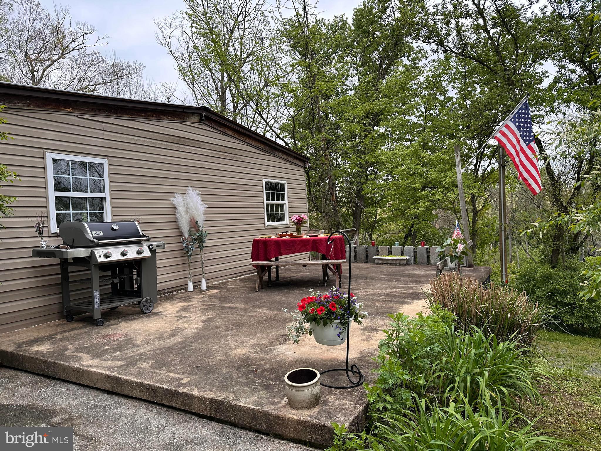 3059 Back Run Road Manheim, PA 17545 - Photo 4 of 19 a view of a backyard with sitting area and furniture