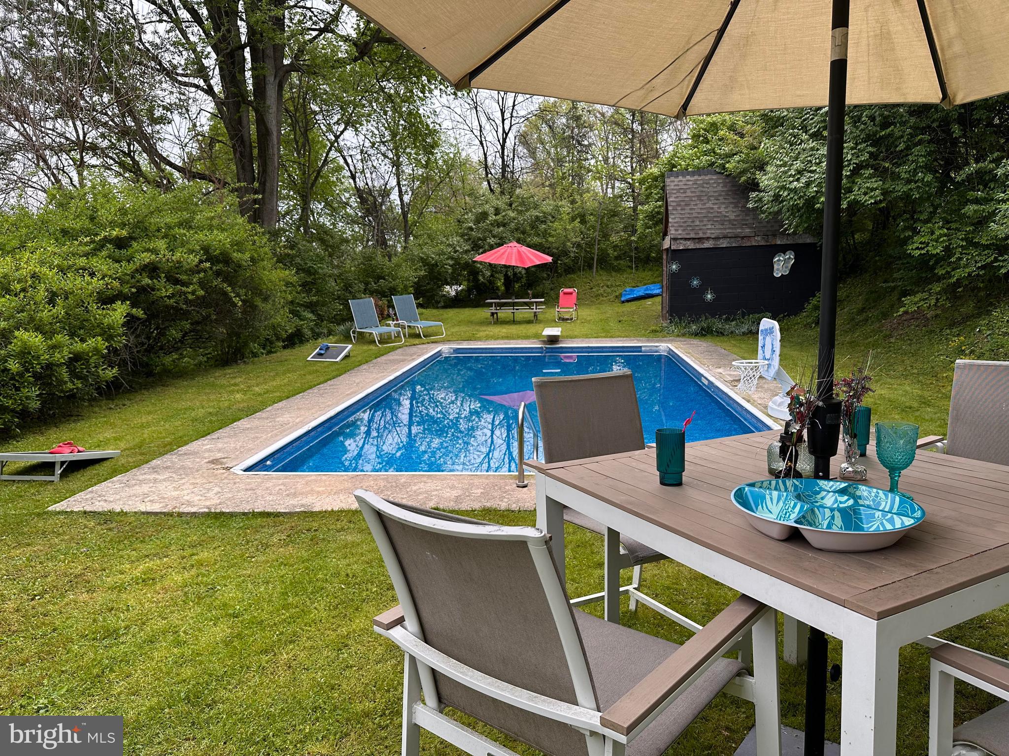 3059 Back Run Road Manheim, PA 17545 - Photo 5 of 19 a view of an outdoor sitting area with swimming pool