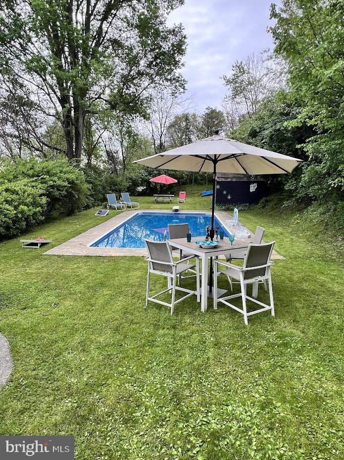 3059 Back Run Road Manheim, PA 17545 - Photo 8 of 19 a lawn chair sitting in the grass near a yard
