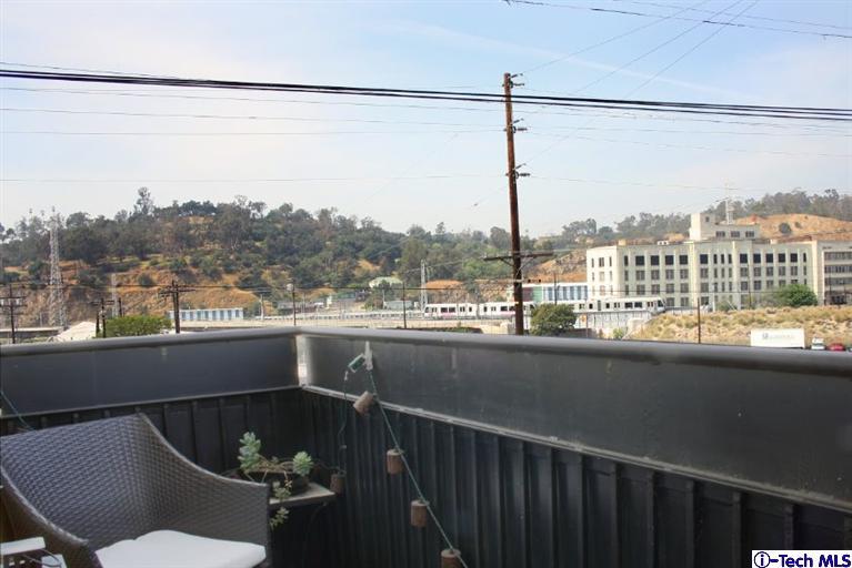 200 North San Fernando Road, Unit 314 Lincoln Heights, CA 90031 - Photo 13 of 28 a view of a balcony with furniture