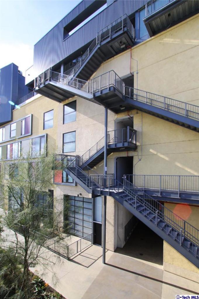 200 North San Fernando Road, Unit 314 Lincoln Heights, CA 90031 - Photo 23 of 28 a front view of a house with a balcony