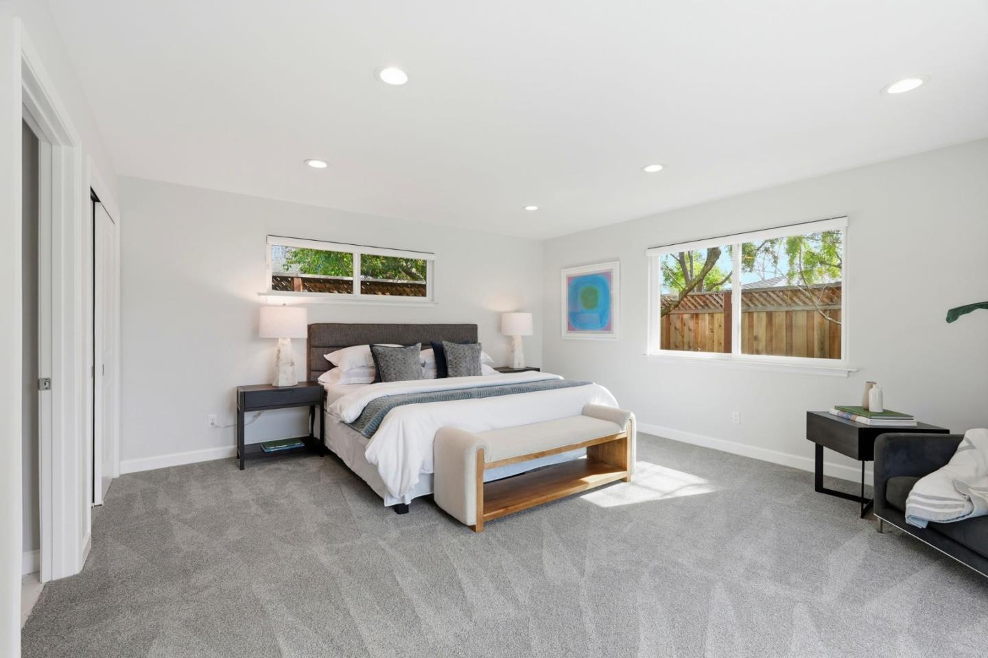 1380 Ridgeley Drive Campbell, CA 95008 - Photo 16 of 39 a spacious bedroom with a bed and a window