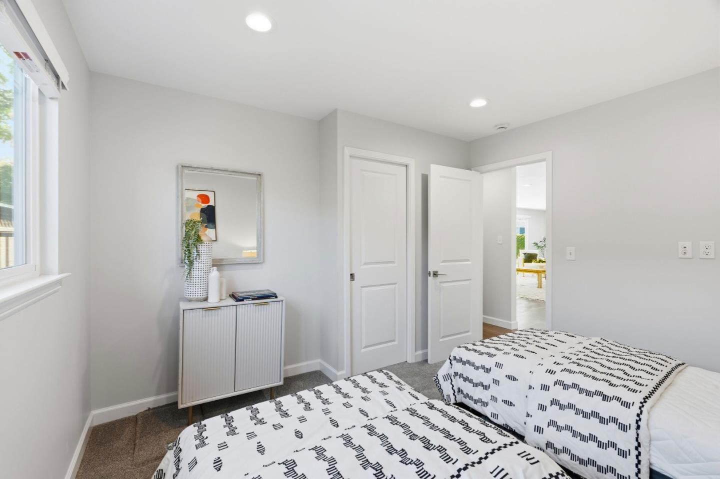1380 Ridgeley Drive Campbell, CA 95008 - Photo 20 of 39 a bedroom with a bed and a window