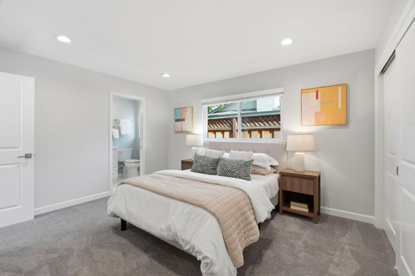 1380 Ridgeley Drive Campbell, CA 95008 - Photo 22 of 39 a bedroom with a bed and a night stand