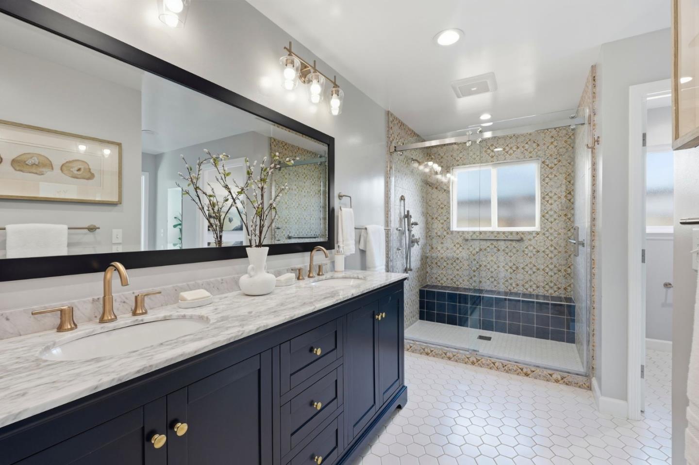 1380 Ridgeley Drive Campbell, CA 95008 - Photo 25 of 39 a spacious bathroom with a granite countertop sink mirror and shower