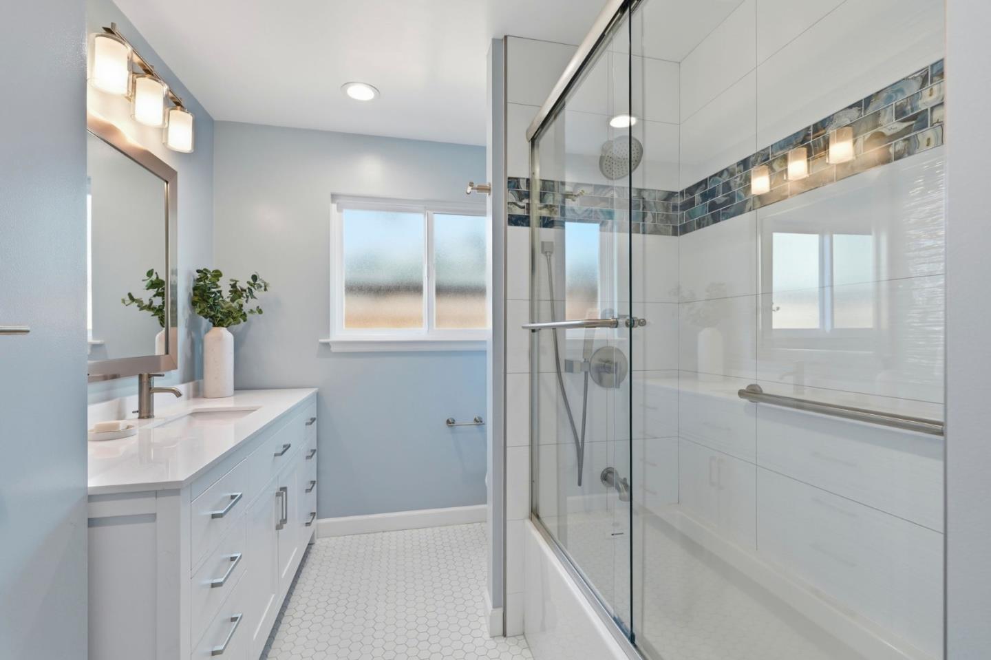 1380 Ridgeley Drive Campbell, CA 95008 - Photo 27 of 39 a bathroom with a double vanity sink mirror and shower