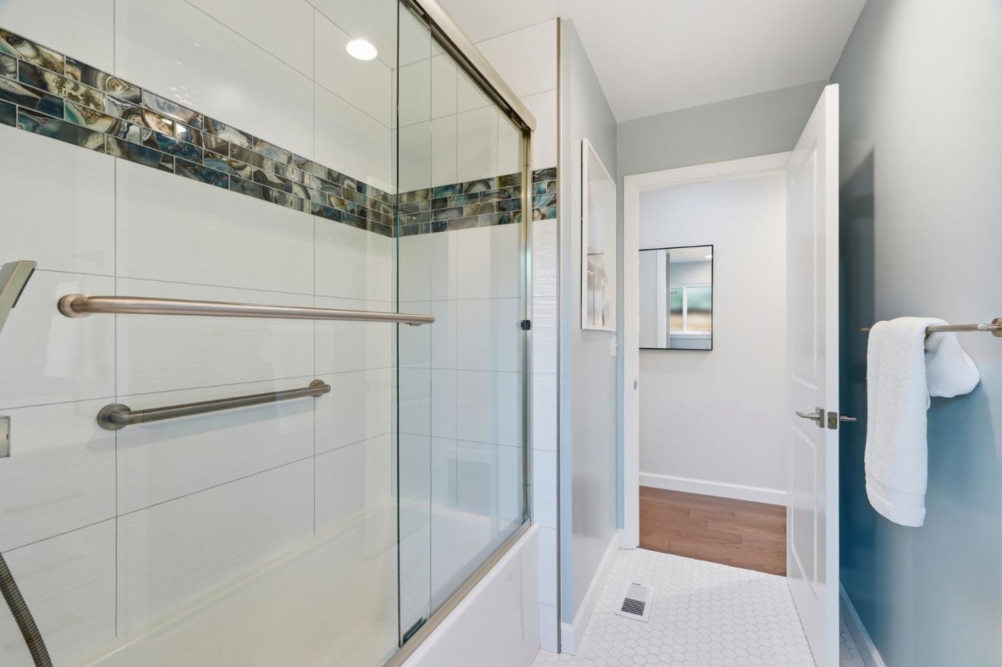 1380 Ridgeley Drive Campbell, CA 95008 - Photo 28 of 39 a bathroom with a shower and a tub