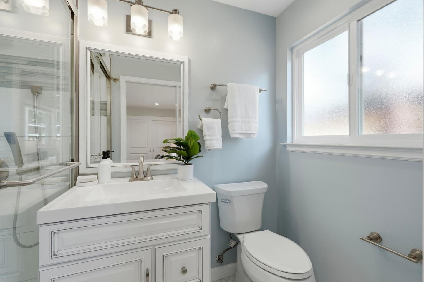 1380 Ridgeley Drive Campbell, CA 95008 - Photo 29 of 39 a bathroom with a sink toilet and mirror