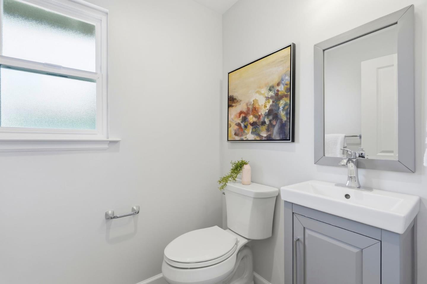 1380 Ridgeley Drive Campbell, CA 95008 - Photo 30 of 39 a bathroom with a toilet sink and mirror