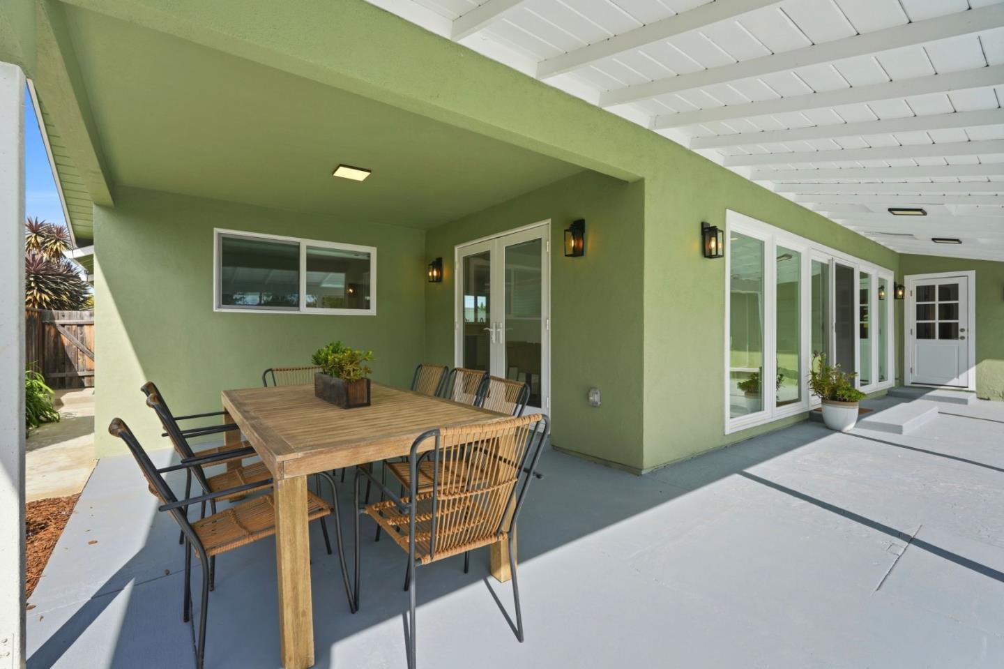 1380 Ridgeley Drive Campbell, CA 95008 - Photo 32 of 39 a view of a patio with table and chairs