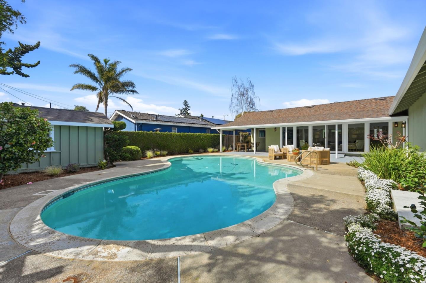 1380 Ridgeley Drive Campbell, CA 95008 - Photo 36 of 39 a view of a house with a swimming pool