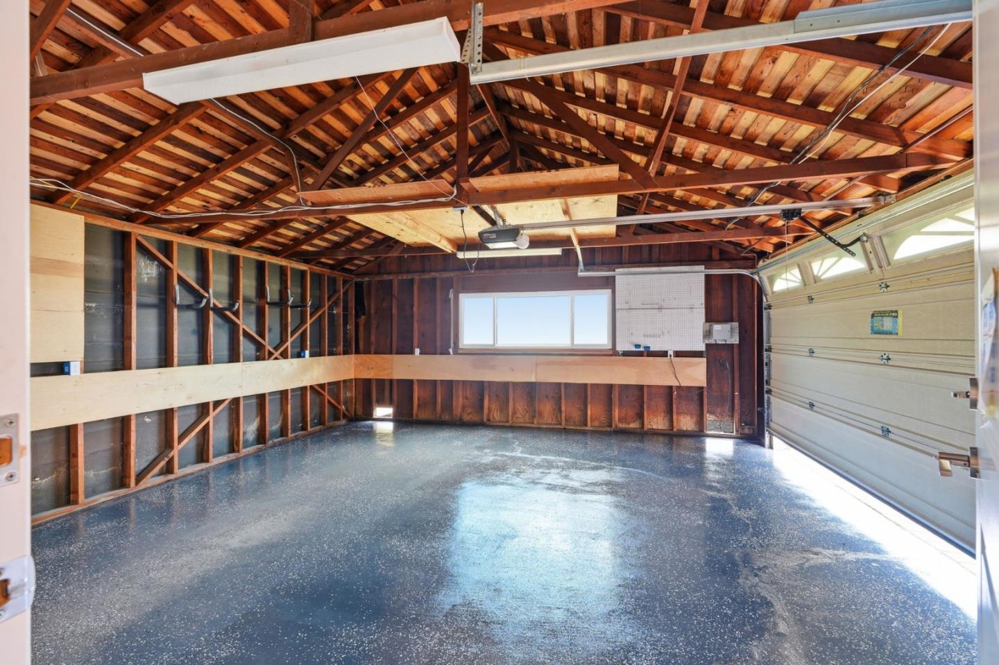 1380 Ridgeley Drive Campbell, CA 95008 - Photo 37 of 39 a view of an empty room with wooden roof