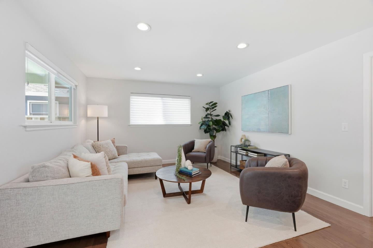 1380 Ridgeley Drive Campbell, CA 95008 - Photo 9 of 39 a living room with furniture and a potted plant