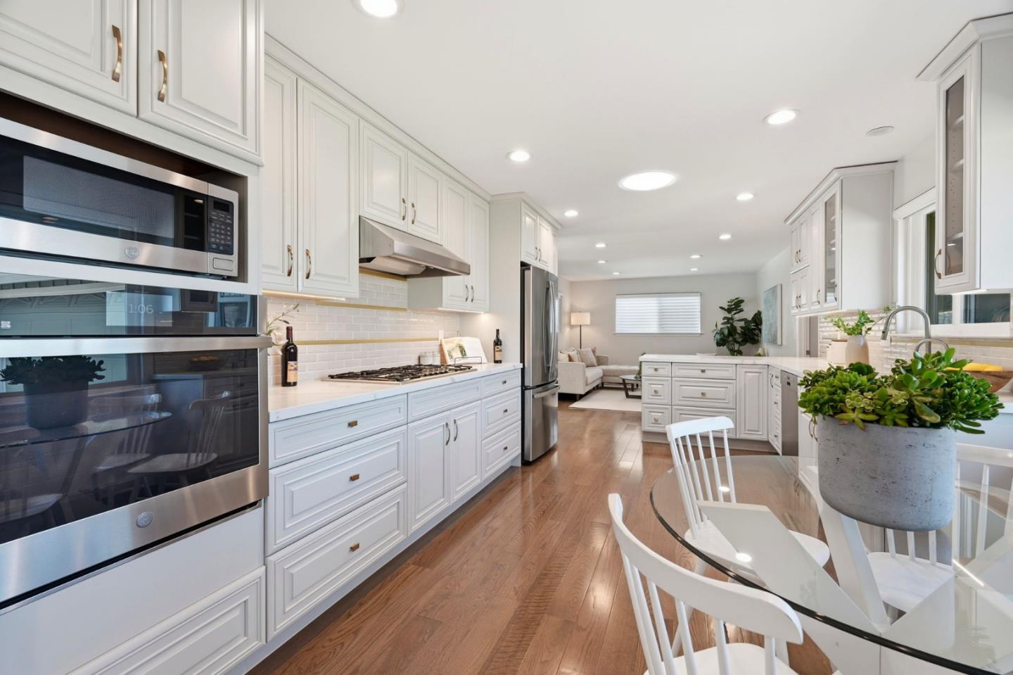 1380 Ridgeley Drive Campbell, CA 95008 - Photo 10 of 39 a kitchen with stove and cabinets
