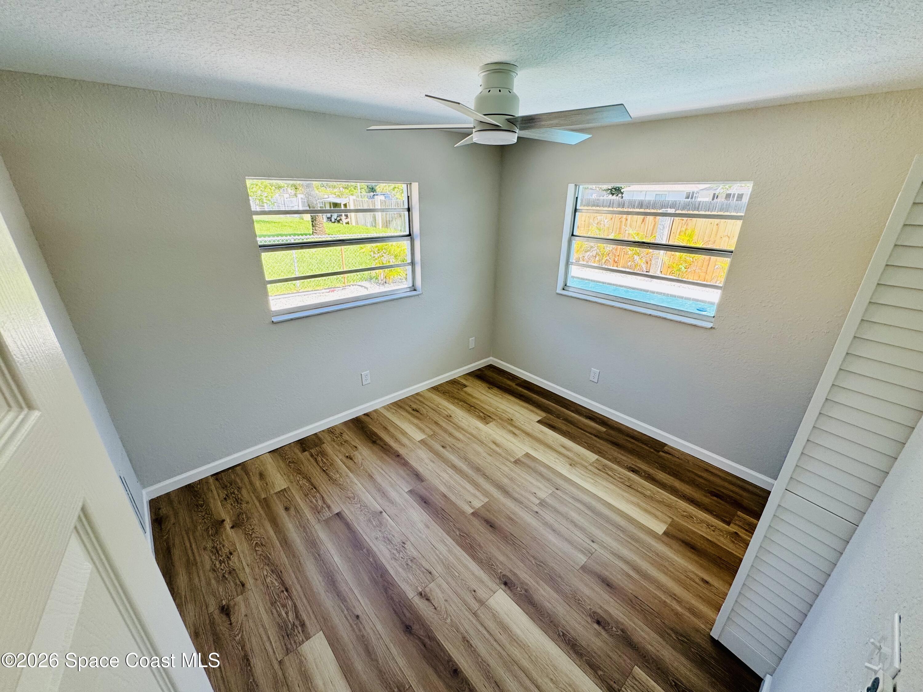 1910 Tallridge Road Melbourne, FL 32935 - Photo 16 of 34 Back bedroom from entry