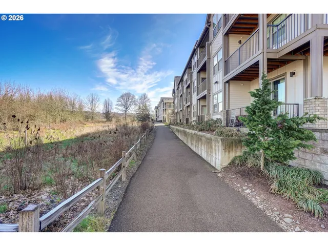 a view of a lake with a building in the background